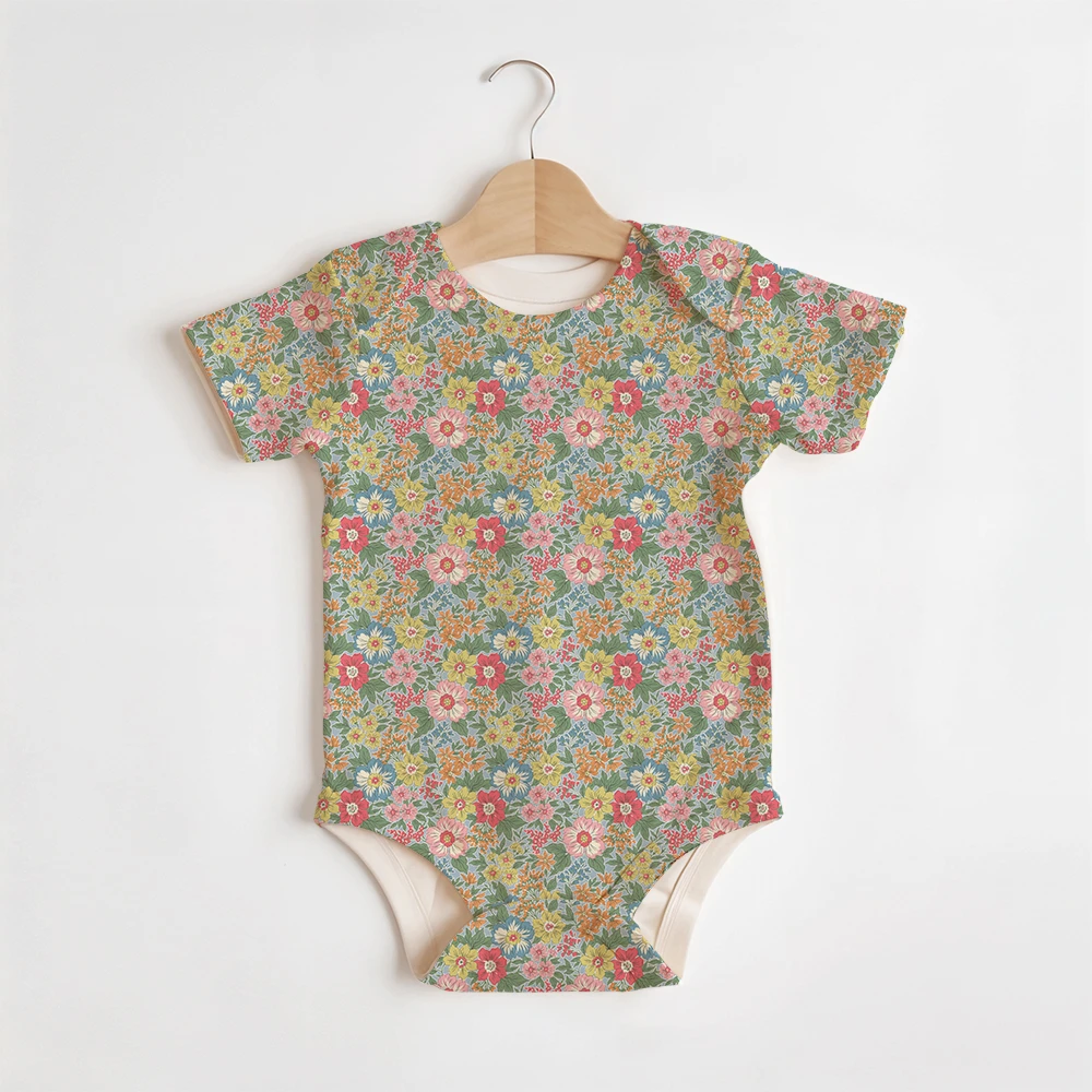 Summer Baby/Toddler Short-Sleeve Romper With Crotch Snaps – Vintage Ditsy Pastel Flowers on Blue Background